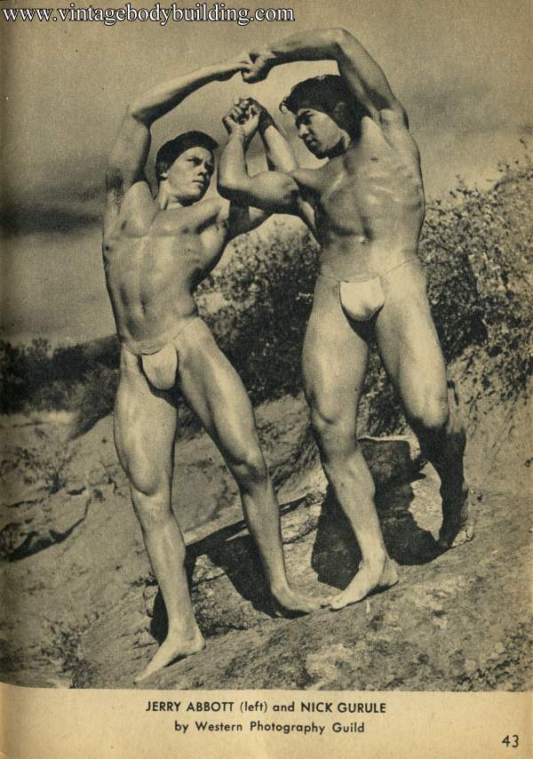 two muscle men outdoors